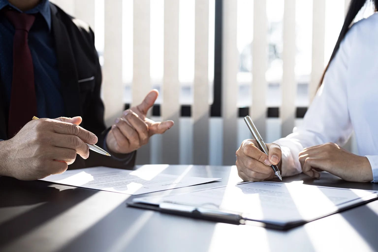 Finalizing a group health insurance plan for a business