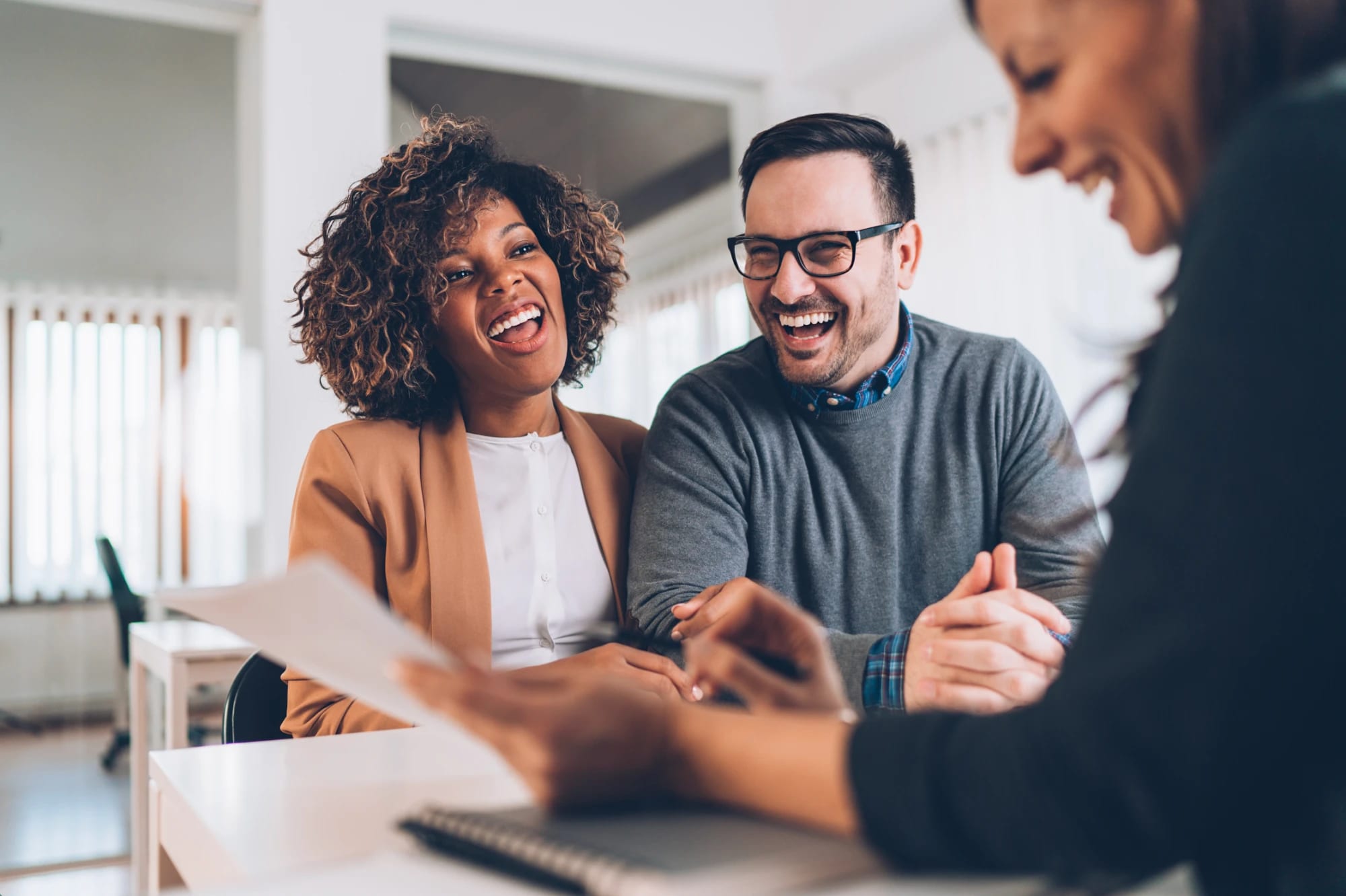 A happy couple meeting with their Health Insurance Experts advisor in Omaha, Nebraska